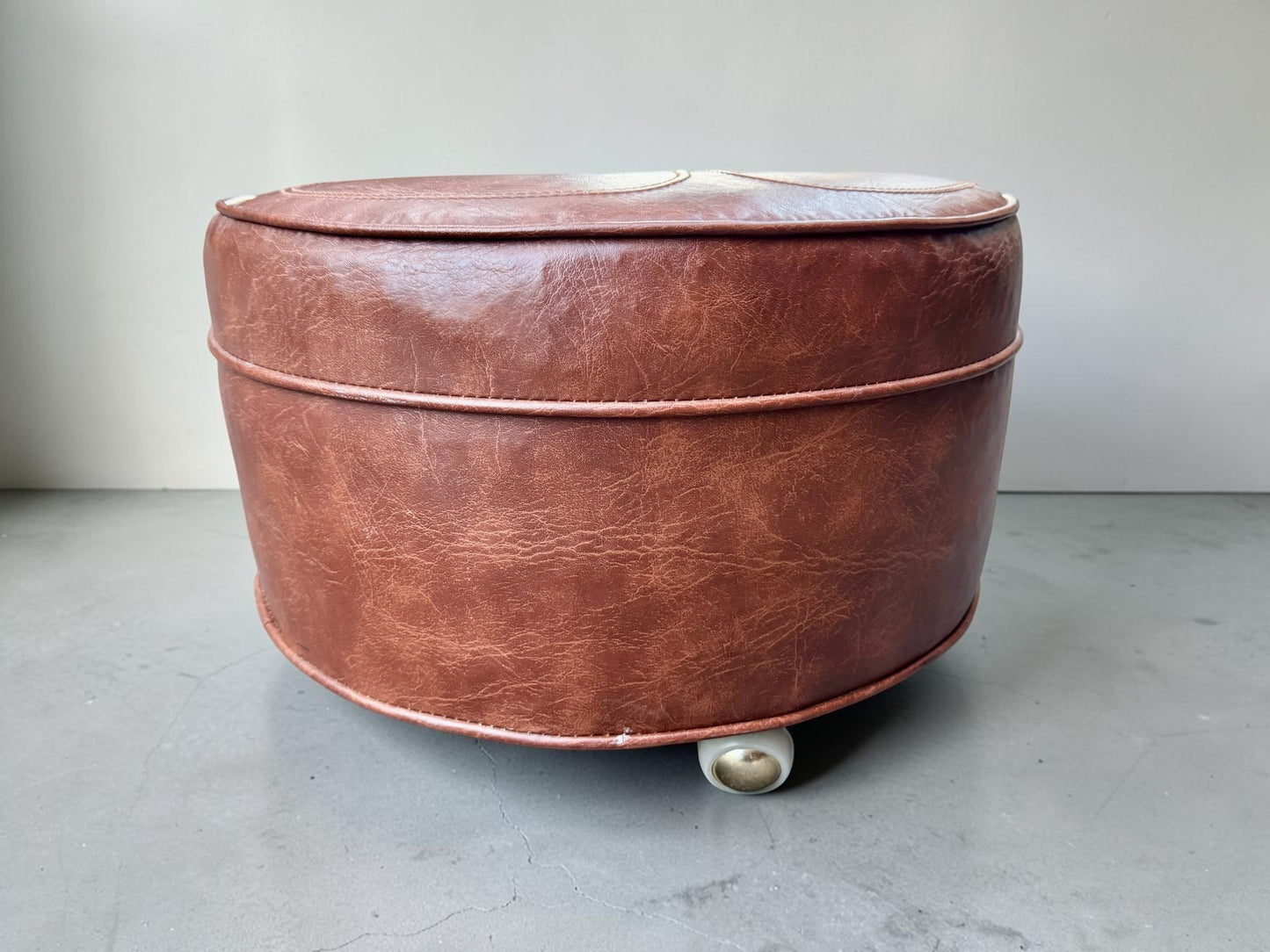 Vintage Round Tufted Vinyl Ottoman on Casters — 19.5"D x 12"H Cognac Brown, MCM Style